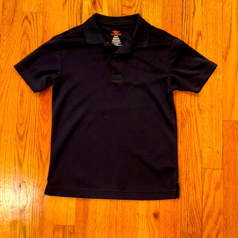 Dockers Kids Black polo shirt sleeve. NWOT. Never worn. Size 7